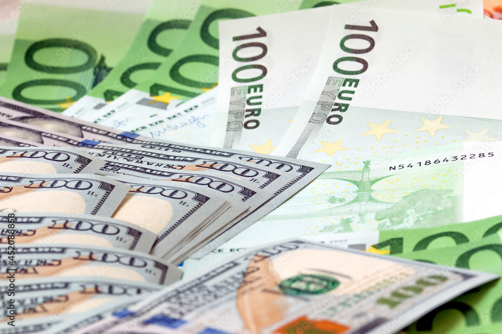 banknotes of 100 dollars and 100 euros, close-up banknotes of 100 dollars and 100 euros, close-up
