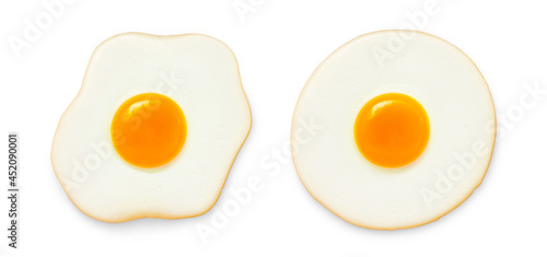 Irregular shaped fried egg and round shape isolated on white background.