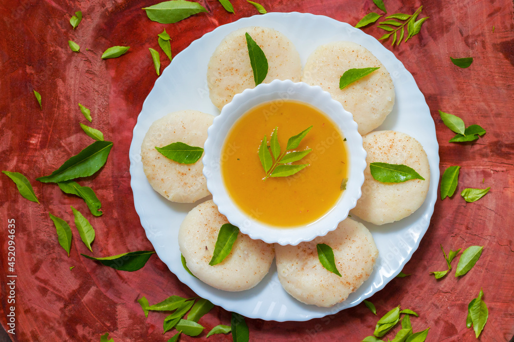 famous South Indian food Idly/idli is ready to serve. Stock Photo