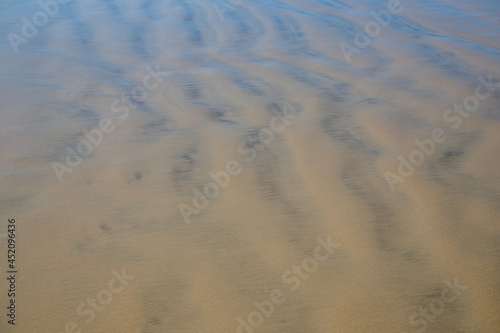 Sand texture., marks in the sand on the beach when the tide goes out