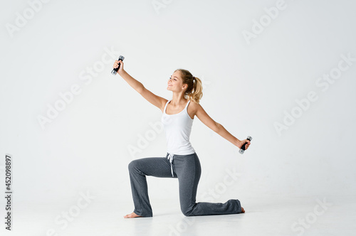 athletic woman motivation workout exercise dumbbells energy slim figure
