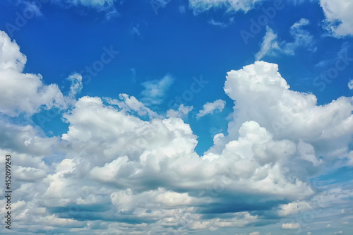 Fototapeta Naklejka Na Ścianę i Meble -  white clouds on blue sky background, abstract seasonal wallpaper, sunny day atmosphere