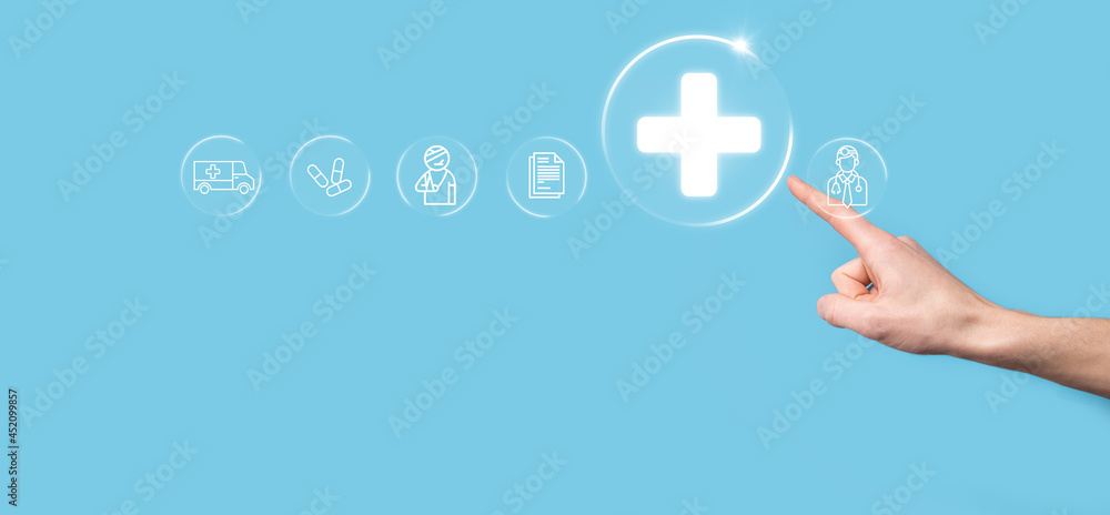 Businessman hold virtual plus medical network connection icons. Covid-19 pandemic develop people awareness and spread attention on their healthcare.Doctor,document,medicine,ambulance,patient icon. Businessman hold virtual plus medical network connection icons. Covid-19 pandemic develop people awareness and spread attention on their healthcare.Doctor,document,medicine,ambulance,patient icon.