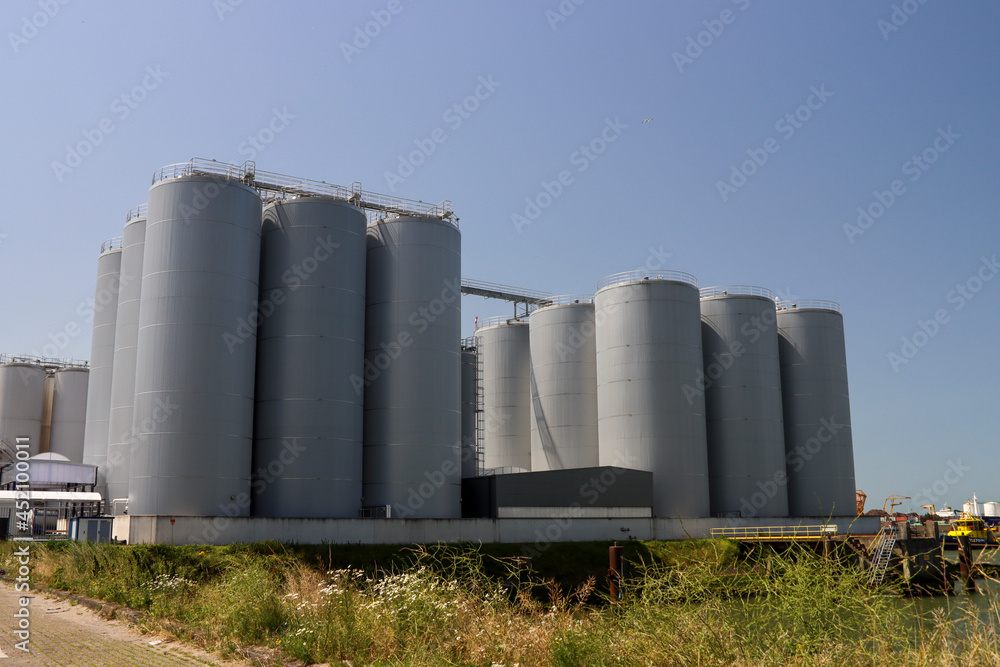 Oil storage tanks at the Maastank terminal in the Botlek harbor Oil storage tanks at the Maastank terminal in the Botlek harbor