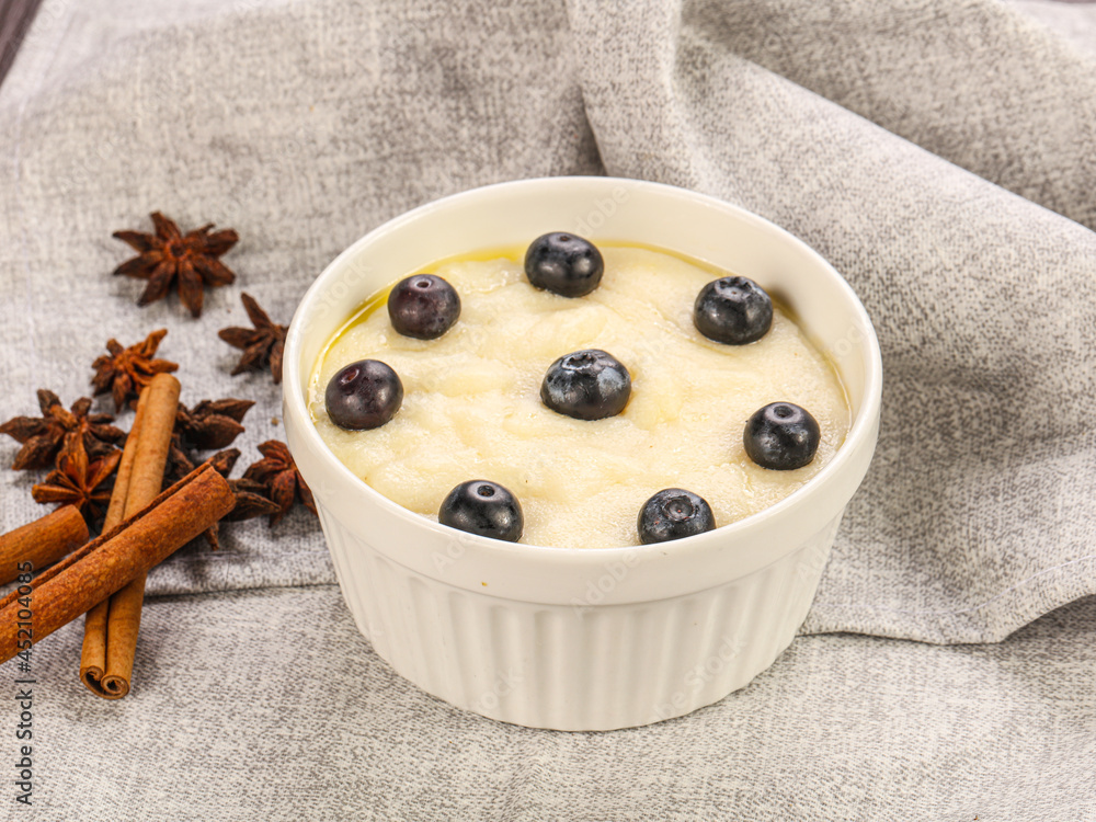 Tasty dairy porrige with berries