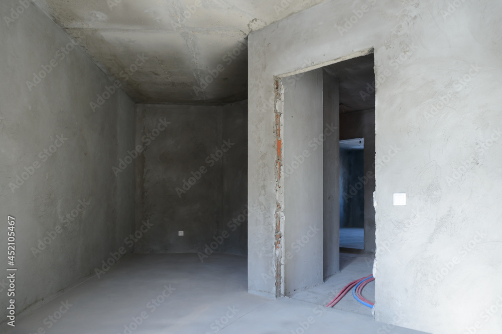 The interior of several rooms without finishing in a new building
