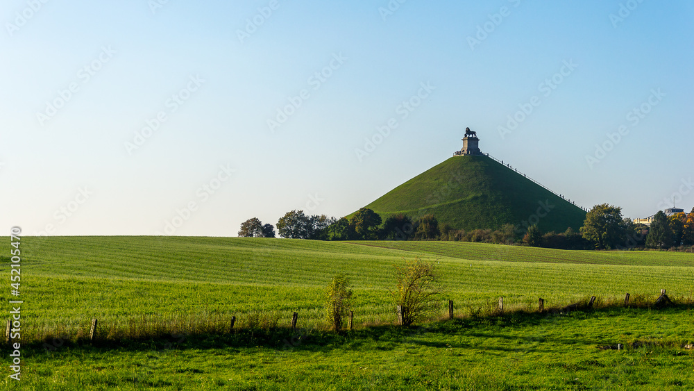 A common autumn day at the Lion's Mound (Butte du Lion) memorial site, a monument to the casualties of the 1815 Battle of Waterloo in Wallonia, Belgium - obrazy, fototapety, plakaty 