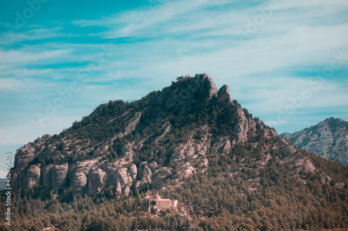 Santa Barbara Mountain and Saint Salvador Horta monastery Convent of Angels, Horta de Sant Joan, Catalonia, Spain photo