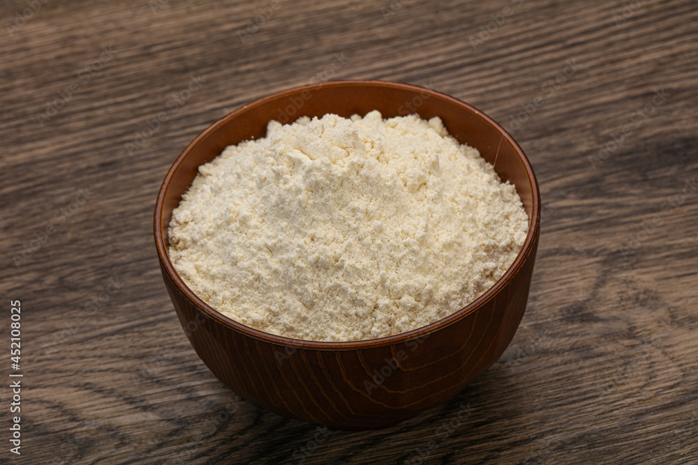 Wheat flour heap in the bowl Wheat flour heap in the bowl