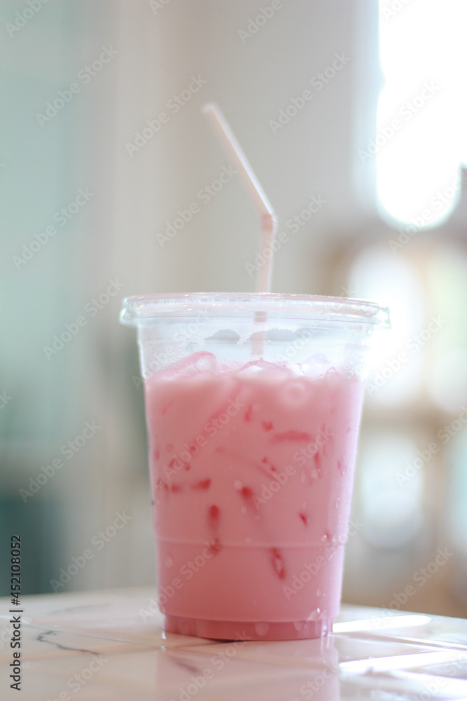 Close-up beverage of strawberry milk for Summer put on the table. Close-up beverage of strawberry milk for Summer put on the table.