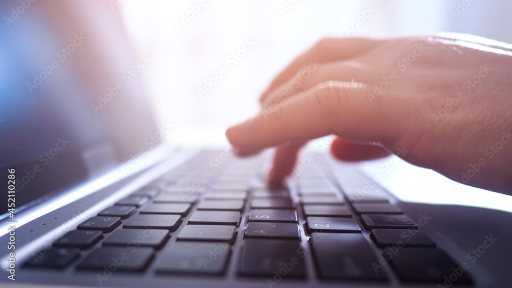 Close-up of hands of woman typing on laptop. Close-up of hands of woman typing on laptop.