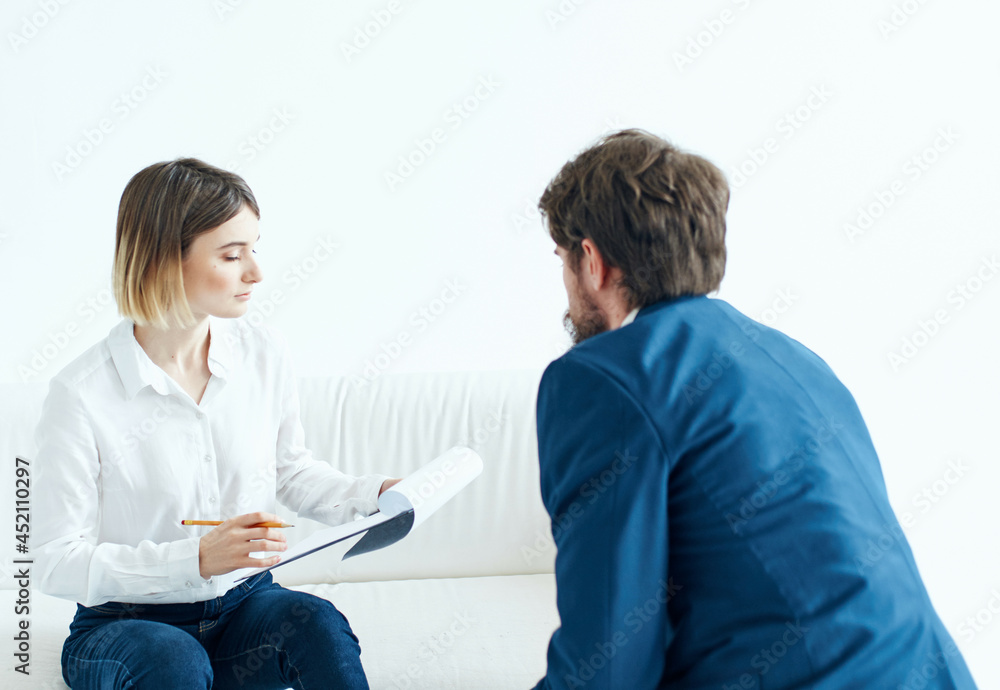 man and woman communicate work team documents man and woman communicate work team documents