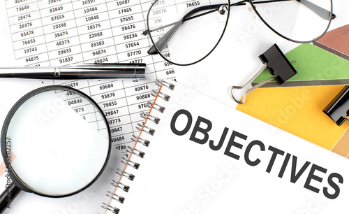 OBJECTIVES - the inscription of text on the Notepad, and chart. Business concept photo