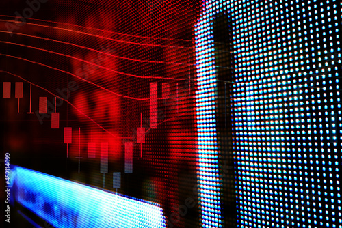 Abstract financial trading graphs and digital number of foreign exchange market trading on monitor. Background of gold and blue digital chart to represent stock market trend.	
 photo