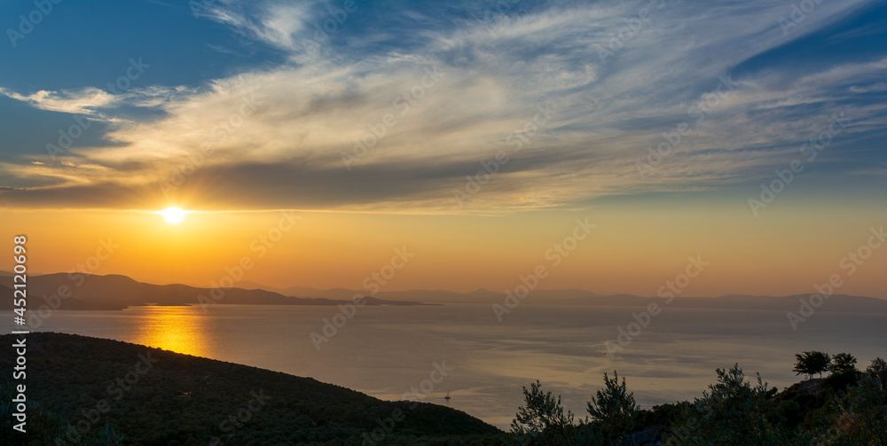 Beautiful sunset over Aegean Sea in Pelion Peninsula, Greece.