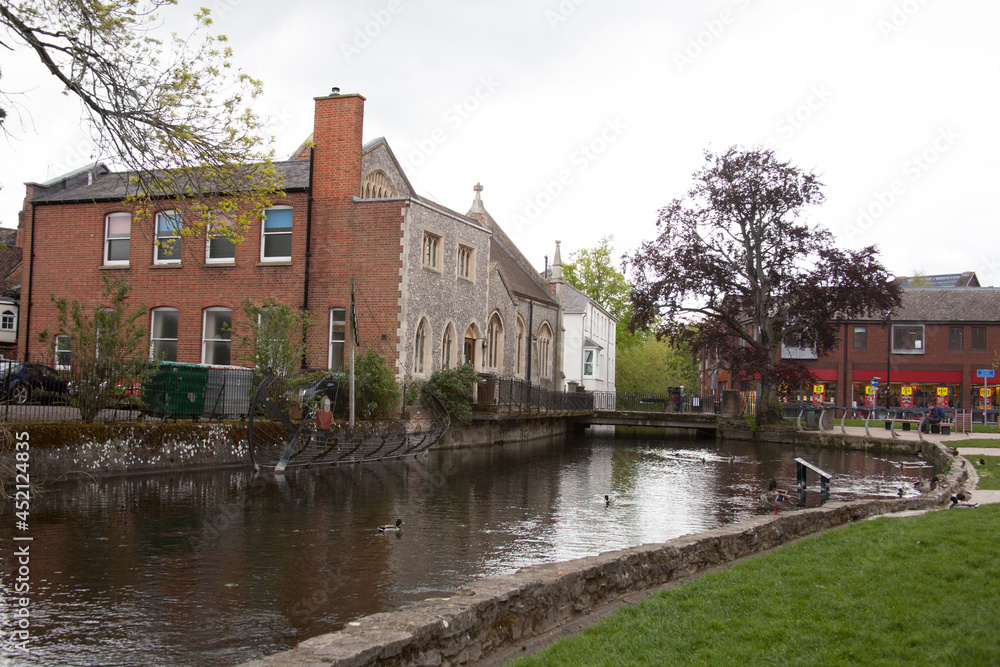 Views of the River Anton through Andover town centre in Hampshire in the UK