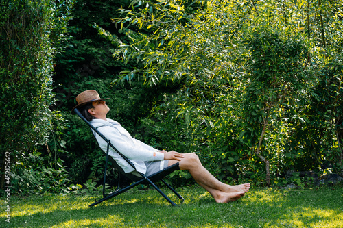 person relaxing in the garden