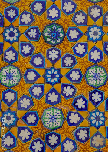 Colorful traditional ancient ceramic tiles geometric and floral decor on wall of Sachal Sarmast tomb in Daraza Sharif, Khairpur, Sindh, Pakistan