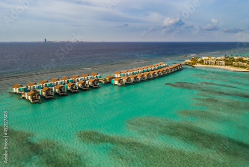 Amazing bird eyes view in Maldives island Eh'mafushi crossroads maldives at sunrise. Aerial drone shot. Hard rock hotel. July 2021