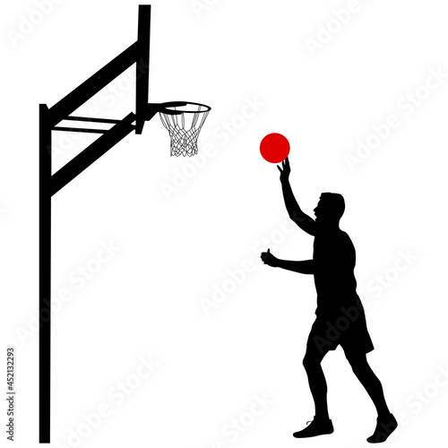 Silhouette of a basketball player on a white background