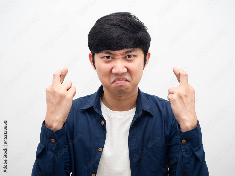 Man angry face corss finger portrait white background head shot,Asian man not satisfied Man angry face corss finger portrait white background head shot,Asian man not satisfied
