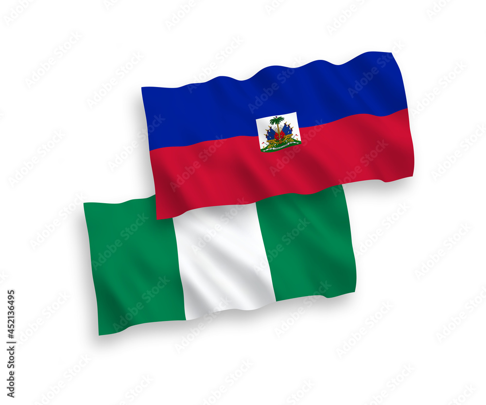 National vector fabric wave flags of Republic of Haiti and Nigeria isolated on white background. 1 to 2 proportion.