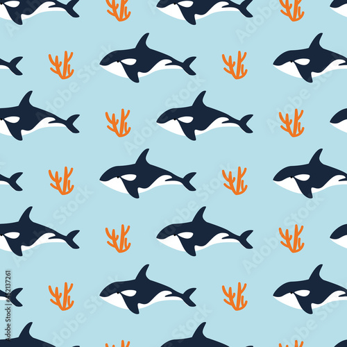 Cheerful seamless pattern with killer whale and coral on a blue background. Textile  print on clothes. Vector illustration in flat style
