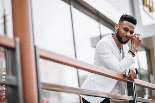 African american man in white jacket