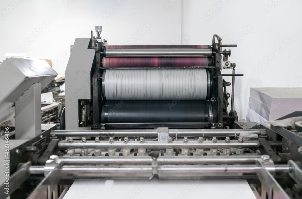 The offset press in the production process in the printing factory The offset press in the production process in the printing factory