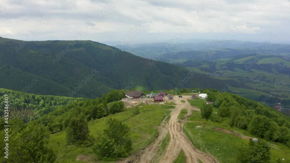Aerial view of a green rural area under blue sky. Beautiful Switzerland nature from above. Aerial view of a green rural area under blue sky. Beautiful Switzerland nature from above.