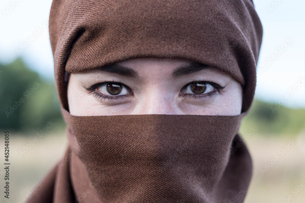 An Afghan woman in a hijab, close-up. The seizure of power. The Taliban. An Afghan woman in a hijab, close-up. The seizure of power. The Taliban.