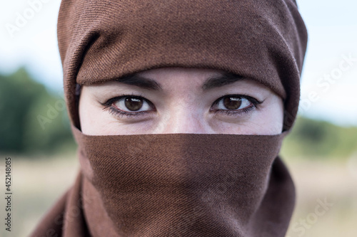Photography An Afghan woman in a hijab, close-up