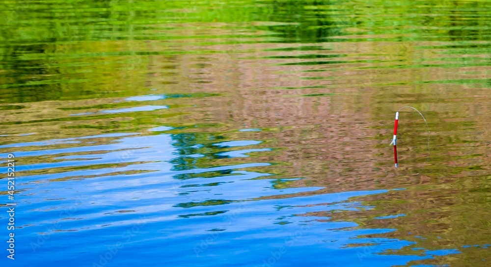 Red float on the water, fishing, water surface. Red float on the water, fishing, water surface.
