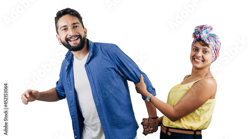 latin man and woman happily pulling boy, on white background