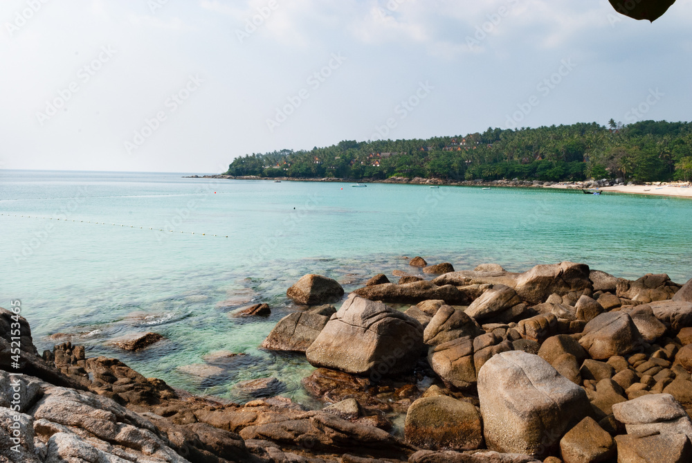 surin beach, sea, bay, sand, stones, blue sky, phuket, thailand surin beach, sea, bay, sand, stones, blue sky, phuket, thailand