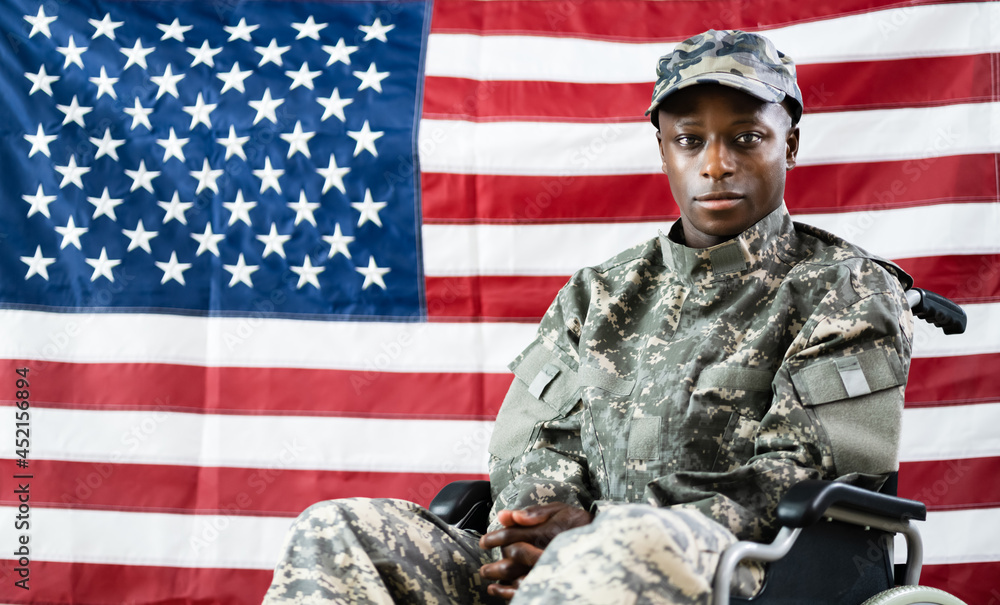 Patriotic Soldier Sitting In Wheel Chair Patriotic Soldier Sitting In Wheel Chair