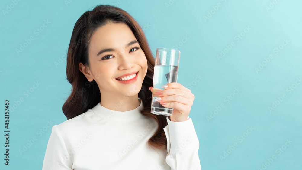 young attractive asian woman who drinks water young attractive asian woman who drinks water