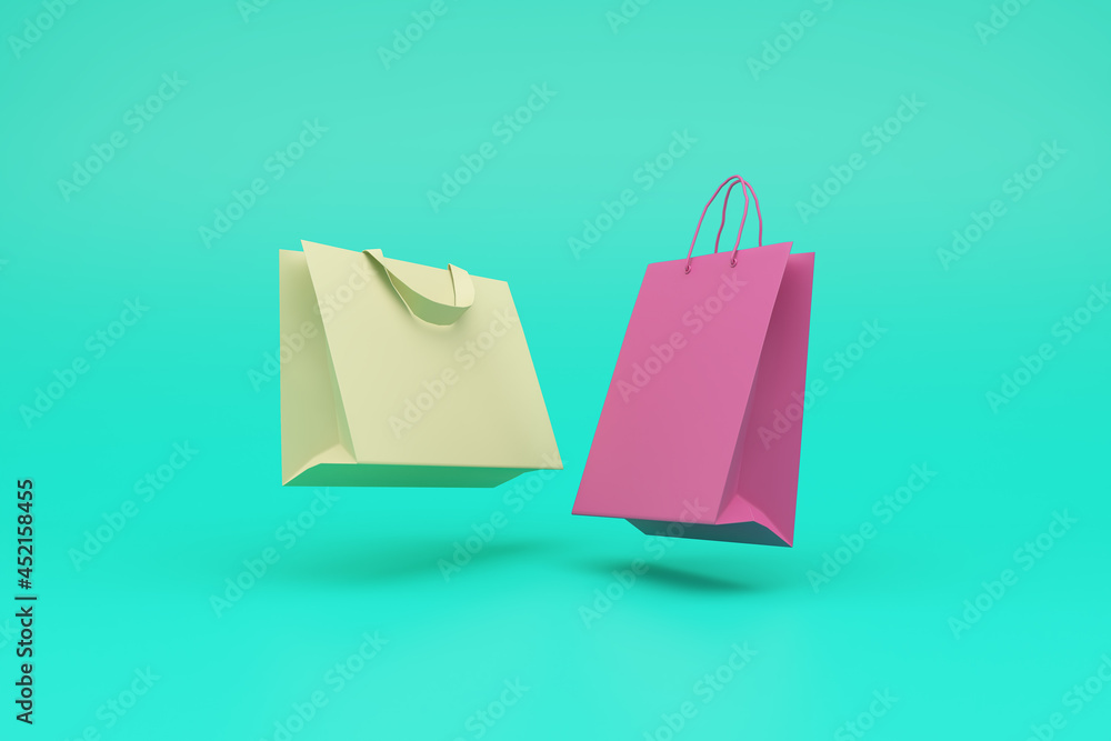 3D neon paper bags on blue background. Online shopping concept. 3d rendering 3D neon paper bags on blue background. Online shopping concept. 3d rendering