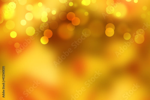 Summer orange autumn background with texture bokeh and blur and sunset light with sparks. glitter golden shimmer. abstract background of thanksgiving filter. 
