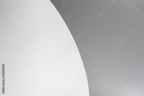 abstract background of curved sheets of paper close-up with a shallow depth of field (blurred)