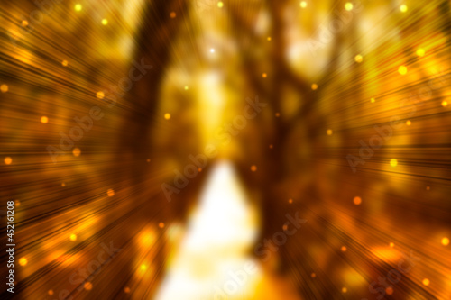 Summer orange autumn background with texture bokeh and blur and sunset light with sparks. glitter golden shimmer. abstract background of thanksgiving filter. 