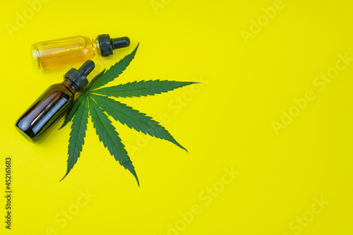 Marijuana hemp tube oil cannsbis organic herbal    cbd is chemical structure for produce medical health care for hospital patient and make business with yellow background.