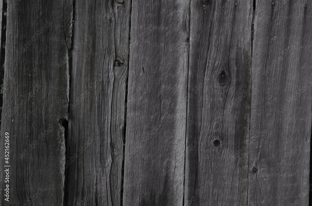 Fototapeta premium A graphic asset consists of old, uneven planks arranged vertically.
