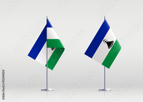 Lesotho flag state symbol isolated on background national banner. Greeting card National Independence Day of the Kingdom of Lesotho. Illustration banner with realistic state flag.