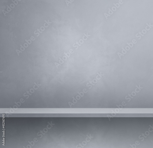 Empty shelf on a grey wall. Background template. Square banner