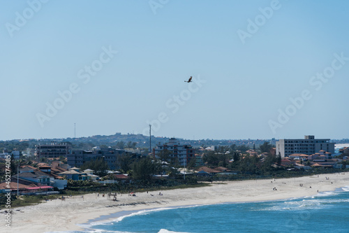 Sunny Day at Itaúna Beach, Saquarema in Rio de Janeiro, Brazil. Famous for waves and surfing. photo