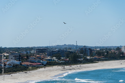 Sunny Day at Itaúna Beach, Saquarema in Rio de Janeiro, Brazil. Famous for waves and surfing. photo