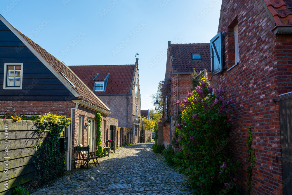 City view on old medieval houses in small historical town Veere in Netherlands, province Zeeland