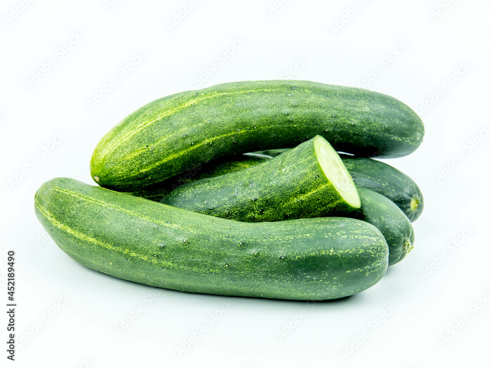 Cucumber and slices isolated on white background. Cucumber and slices isolated on white background.