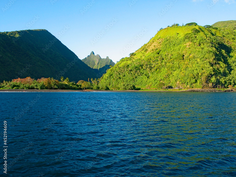 Lush vegetation, hills and mountains on an island, Tahiti, French Polynesia, South Pacific islands. Lush vegetation, hills and mountains on an island, Tahiti, French Polynesia, South Pacific islands.